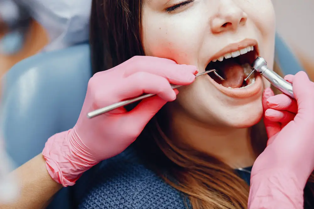 Patient receiving a dentail inlay at Kraja and Sidhu Dental Clinic in Silver Spring