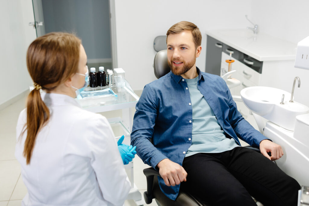 a male patient drom Maryland asking doctor about the dental cleaning procedure